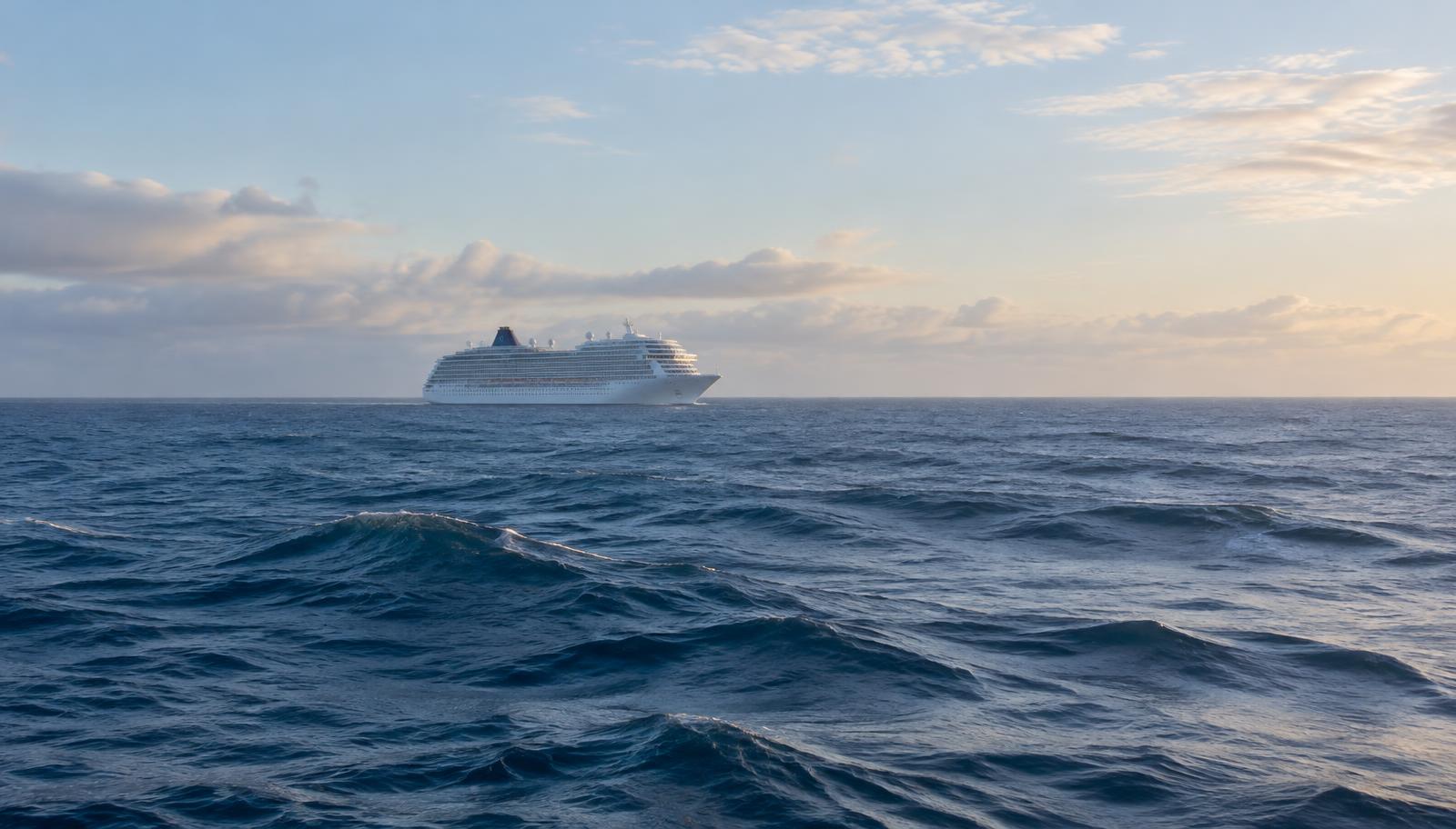 A cruise ship alone on open ocean with no land in sight